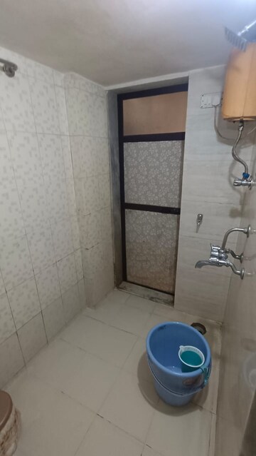 Bathroom in 1 BHK Apartment at Highland Residency CHSL, Balkum Pada – for Rent