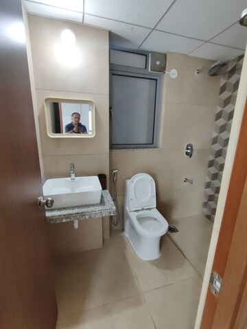 Bathroom in 2 BHK Apartment at Kalpataru Immensa, Kolshet Road – for Rent