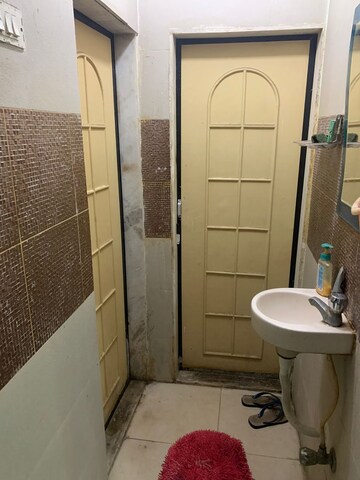 Bathroom in 2 BHK Apartment at Highland Residency CHSL, Balkum Pada – for Rent