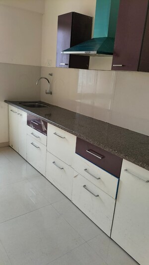 Kitchen in 1 BHK Apartment at Puranik Rumah Bali, Ghodbunder Road – for Sale