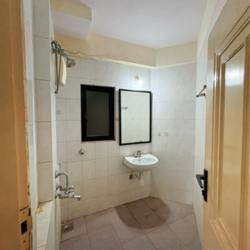 Bathroom in 1 BHK Apartment at Hiranandani Estate Canosa, Patlipada – for Rent
