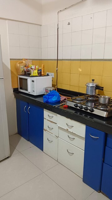 Kitchen in 2 BHK Apartment at Kumar Sophronia, Kalyani Nagar – for Rent