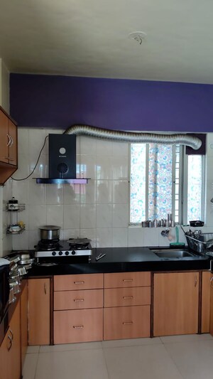 Kitchen in 2 BHK Apartment at Runwal Prestige, Yerawada – for Sale
