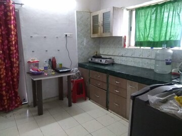Kitchen in 2 BHK Apartment at Shrinath Apartment, Warje – for Rent