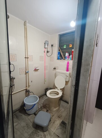 Bathroom in 2 BHK Apartment at Kopar Khairane – for Rent