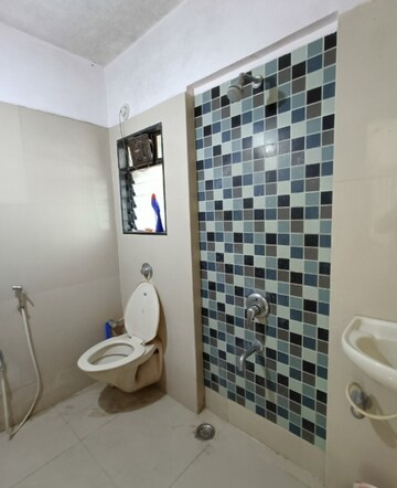 Bathroom in 3 BHK Apartment at Green Acres Apartment, Waghbil – for Sale