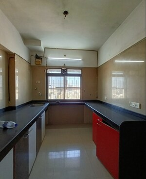 Kitchen in 3 BHK Apartment at Green Acres Apartment, Waghbil – for Sale