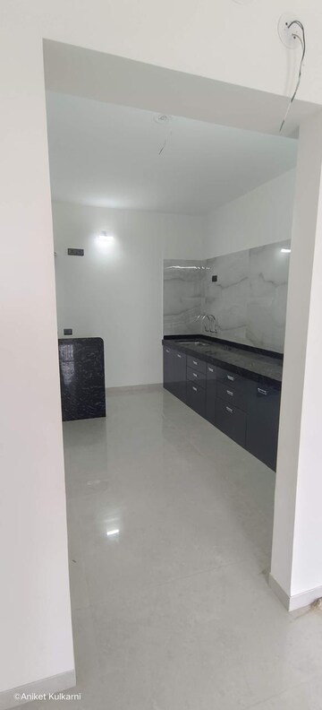 Kitchen in 2 BHK Apartment at Nirman Adi, Kalyani Nagar – for Rent
