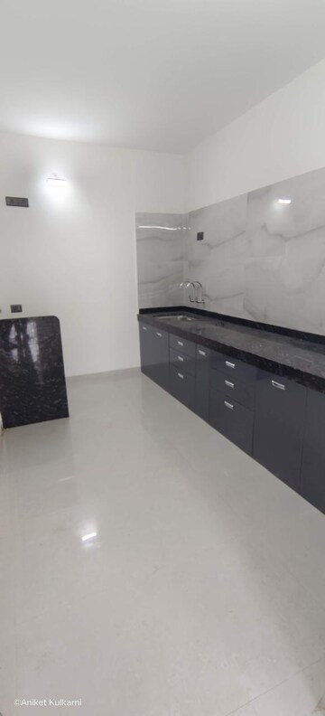 Kitchen in 2 BHK Apartment at Nirman Adi, Kalyani Nagar – for Rent