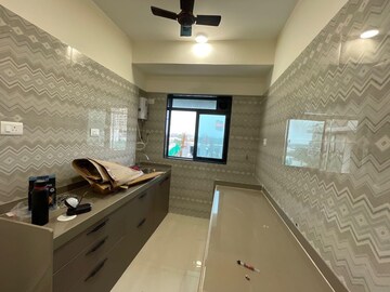 Kitchen in 2 BHK Apartment at Parijat CHS Andheri West, Yari Road – for Rent