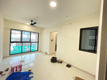 Living Room in 2 BHK Apartment at Parijat CHS Andheri West, Yari Road – for Rent