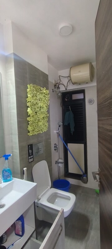 Bathroom in 1 BHK Apartment at Kanakia Rainforest, Andheri East – for Rent