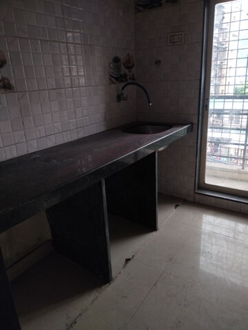 Kitchen in 1 BHK Apartment at Patidar Shree Swami Samarth Krupa, Karanjade – for Sale