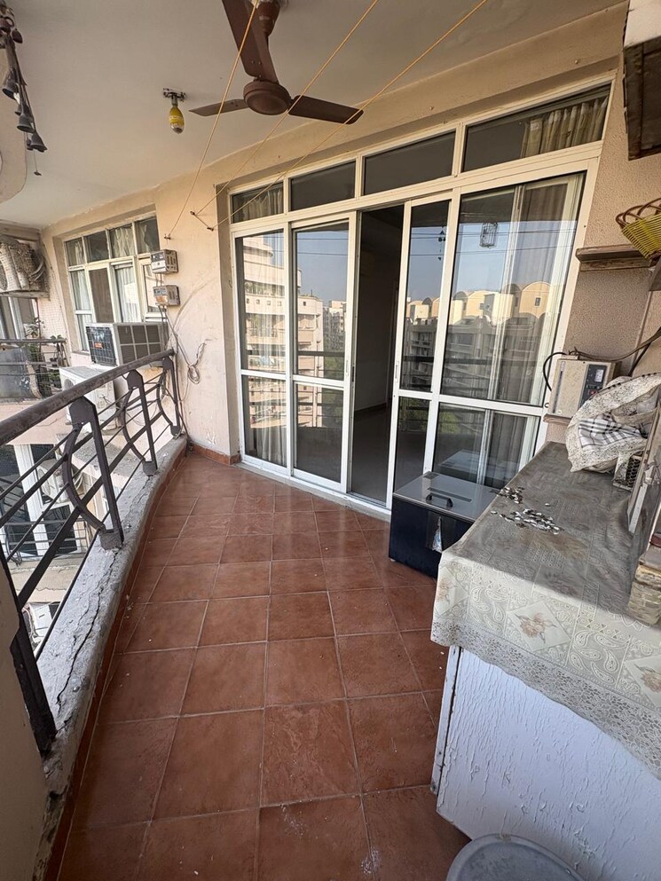 Balcony, supertech-emerald-court-phase-iii 3 Bedroom 1750 Sq.Ft. Apartment In Sector 93a Noida 9060007