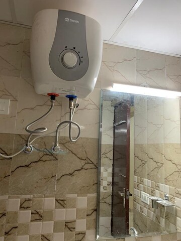 Bathroom in 2 BHK Apartment at Mahagun Mywoods, Sector 16c Greater Noida – for Rent