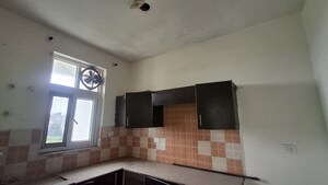 Kitchen in 2 BHK Apartment at Ansal Housing Woodbury, Patiala Road – for Sale