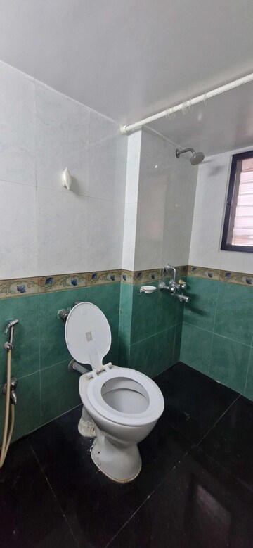 Bathroom in 2 BHK Apartment at Andheri CHS, Andheri West – for Rent