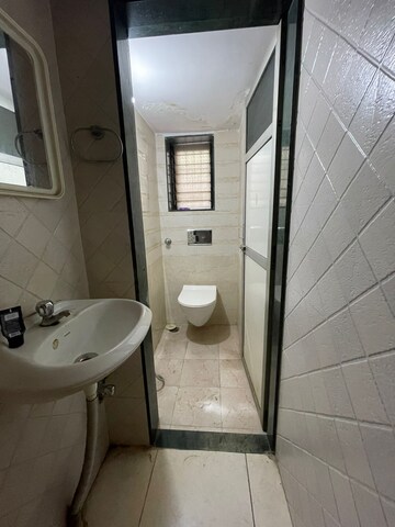 Bathroom in 1 BHK Apartment at Shradha Saburi Apartment, Dombivli East – for Rent