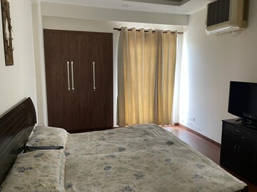Bedroom in 2 BHK Builder Floor at DLF Exclusive Floors, Sector 53 – for Rent