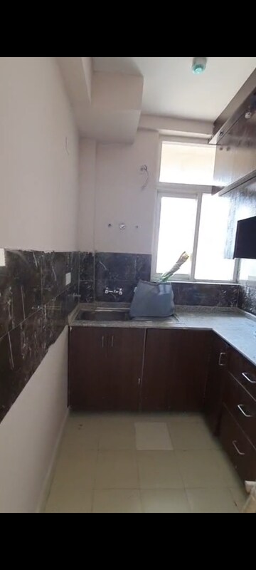 Kitchen in 2 BHK Apartment at Amrapali Riverview, Amrapali Leisure Valley – for Rent