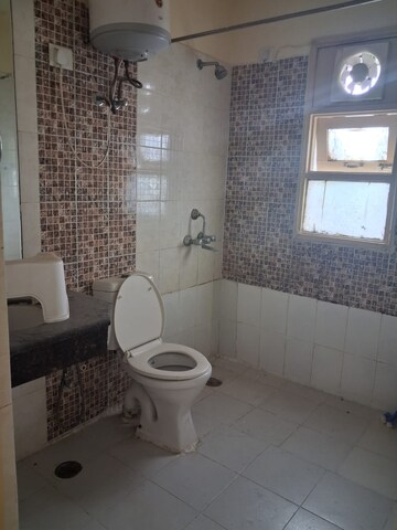 Bathroom in 4 BHK Apartment at Omaxe The Olive Heights, Sector 56 – for Rent