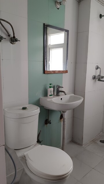 Bathroom in 2 BHK Apartment at Saviour Park, Mohan Nagar – for Rent