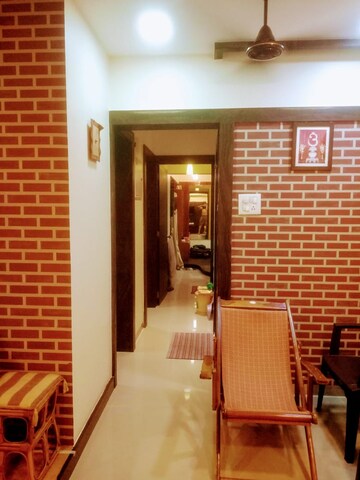 Living Room in 2 BHK Apartment at Jasmine CHS, Kavesar – for Sale