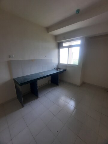 Kitchen in 1 RK Apartment at Puraniks City Reserva, Ghodbunder Road – for Rent