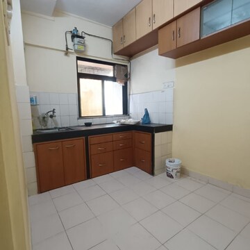 Kitchen in 2 BHK Apartment at Eden Rose Apartment, Kanakia Road – for Rent
