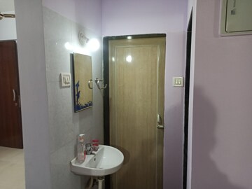 Bathroom in 1 BHK Apartment at Puranik City Phase III, Ghodbunder Road – for Rent