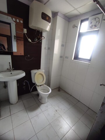 Bathroom in 3 BHK Apartment at Gulmohur Garden, Raj Nagar Extension – for Rent