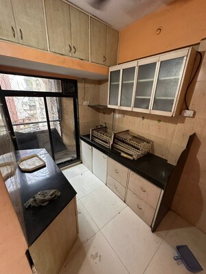 Kitchen in 3 BHK Apartment at Vasundhara Kiran Society, Juinagar – for Sale