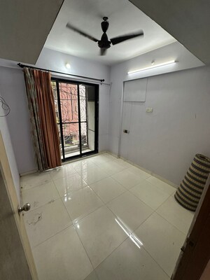 Master Bedroom in 3 BHK Apartment at Vasundhara Kiran Society, Juinagar – for Sale