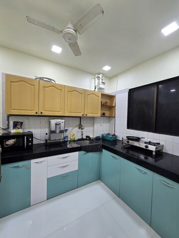 Kitchen in 2 BHK Apartment at Ashok Nagar Complex, Andheri East – for Sale