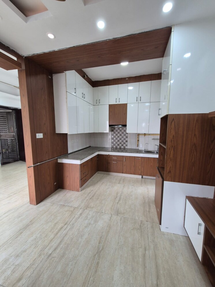 Kitchen, paramount-symphony 2.5 Bedroom 1365 Sq.Ft. Apartment In Sain Vihar Ghaziabad 9060673