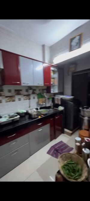 Kitchen in 1 BHK Apartment at Oracle Sapphire CHS, Nerul – for Sale