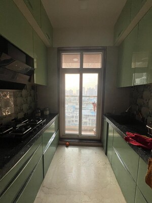Kitchen in 3 BHK Apartment at Abhiraj Apartment, Seawoods Sector 50 – for Sale