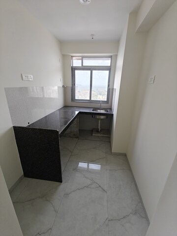 Kitchen in 2 BHK Apartment at Grant Road – for Sale