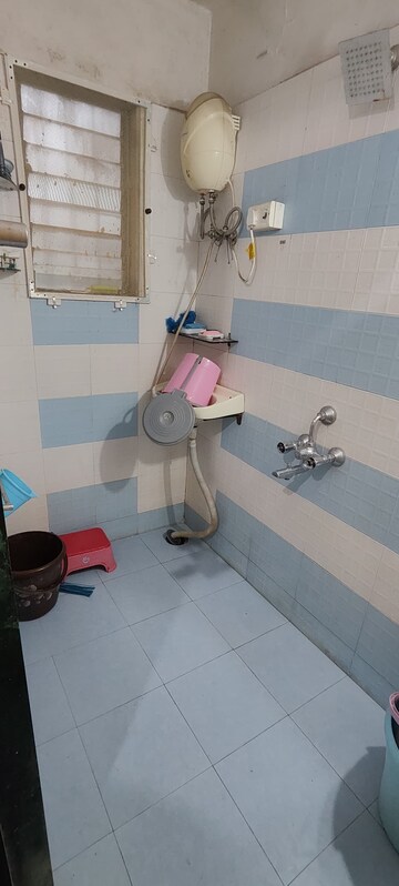 Bathroom in 1 BHK Apartment at Brahamand Phase 6 Chs Ltd, Brahmand – for Sale