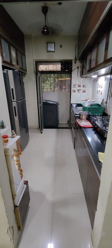 Kitchen in 1 BHK Apartment at Brahamand Phase 6 Chs Ltd, Brahmand – for Sale