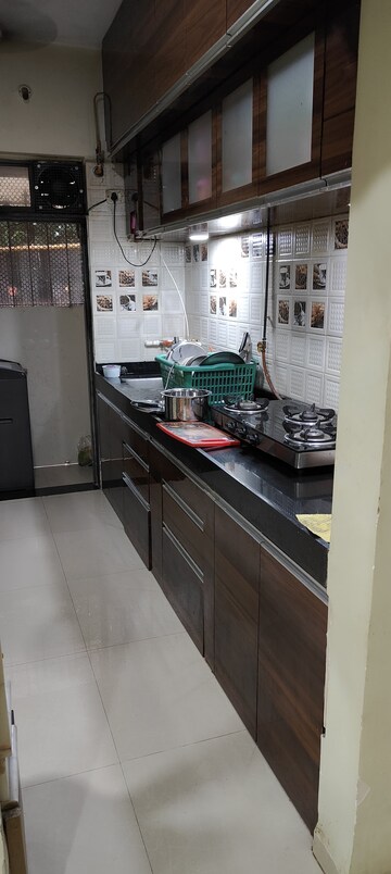 Kitchen in 1 BHK Apartment at Brahamand Phase 6 Chs Ltd, Brahmand – for Sale