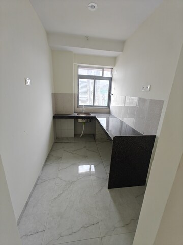Kitchen in 1 BHK Apartment at Grant Road – for Sale