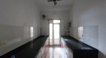 Kitchen in 2 BHK Apartment at Rustomjee Urbania Azziano, Thane West – for Rent