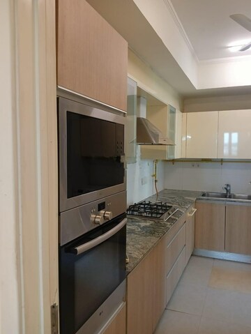 Kitchen in 3 BHK Apartment at Smart World Orchard, Sector 61 – for Rent