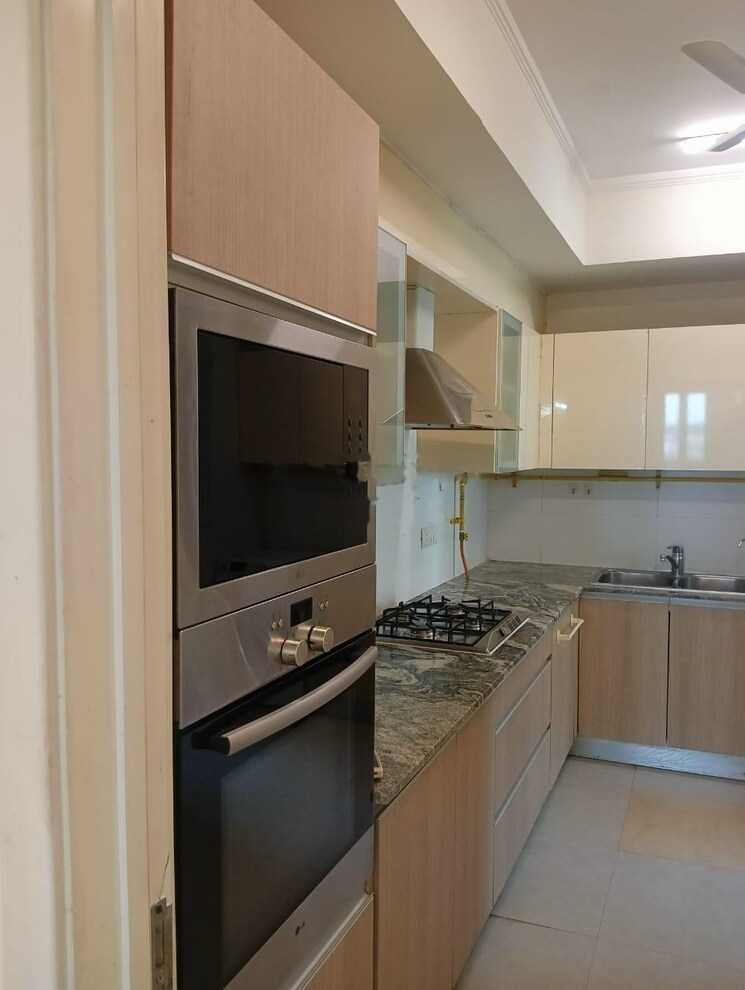 Kitchen, smart-world-orchard 3 Bedroom 1606 Sq.Ft. Apartment In Sector 61 Gurgaon 9060996