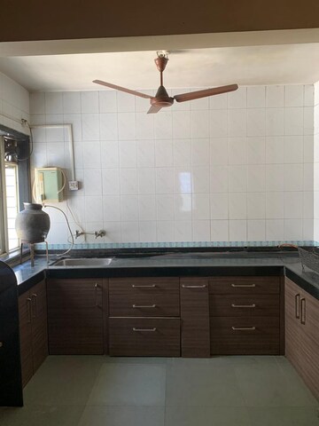Kitchen in 2 BHK Apartment at Vriddhi Padma Madhav, Dahanukar Colony – for Rent