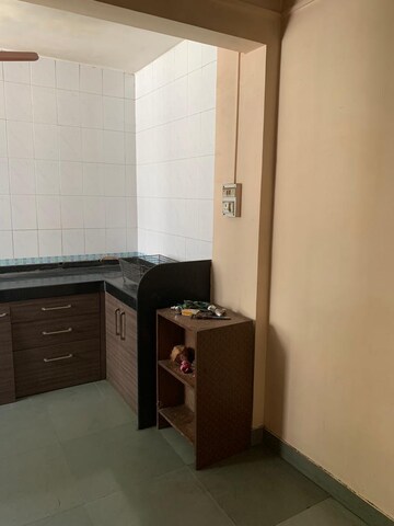 Kitchen in 2 BHK Apartment at Vriddhi Padma Madhav, Dahanukar Colony – for Rent