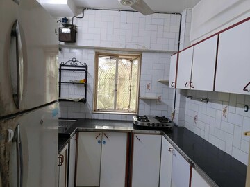 Kitchen in 2 BHK Apartment at Evershine Apartment 2, Andheri West – for Rent