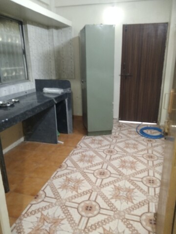 Kitchen in 1 BHK Apartment at Jagrut CHS, Gokhalenagar – for Rent