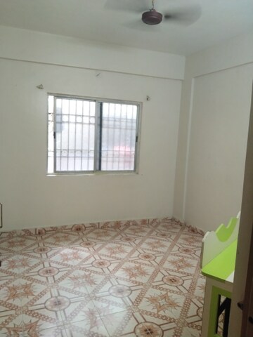 Bedroom in 1 BHK Apartment at Jagrut CHS, Gokhalenagar – for Rent